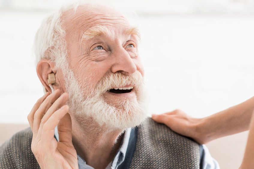 Suffering from tinnitus? Check out tips on buying a hearing aid.